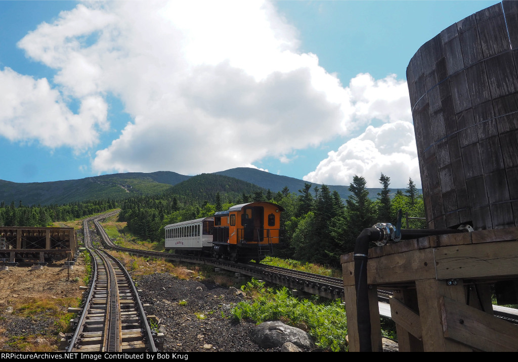 MWCR 7 on the way up Mt Washington passes our train at Waumbek Water Tank